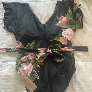 Brand new Albion Fit Desert Rose One Piece (XL)